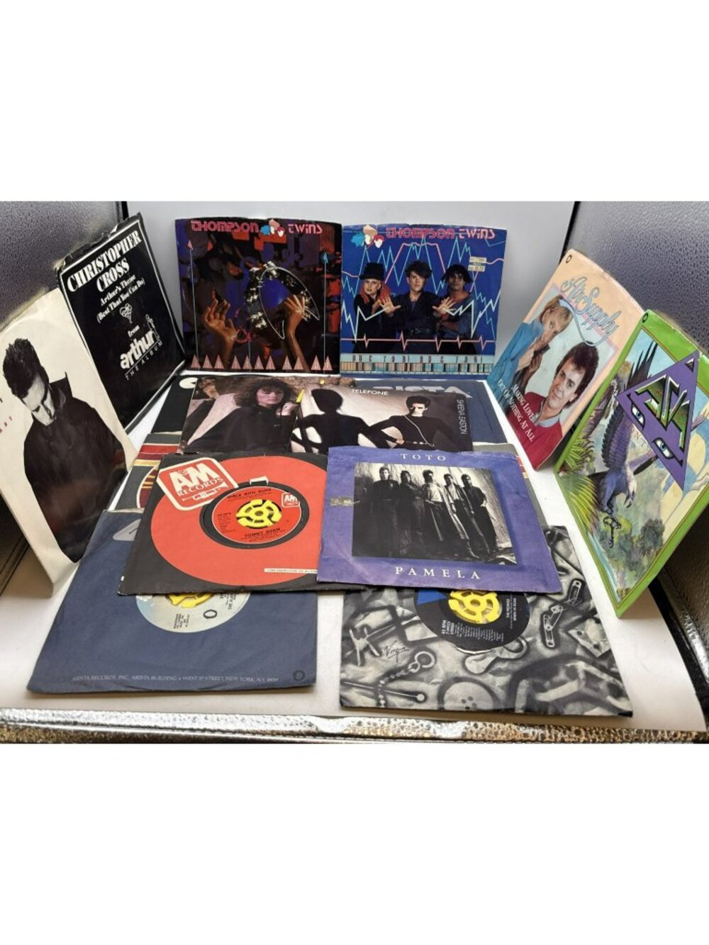 45 RPM RECORDS AND SLEEVES 80S  Music Air Supply Asia Toto And More LOT OF 16